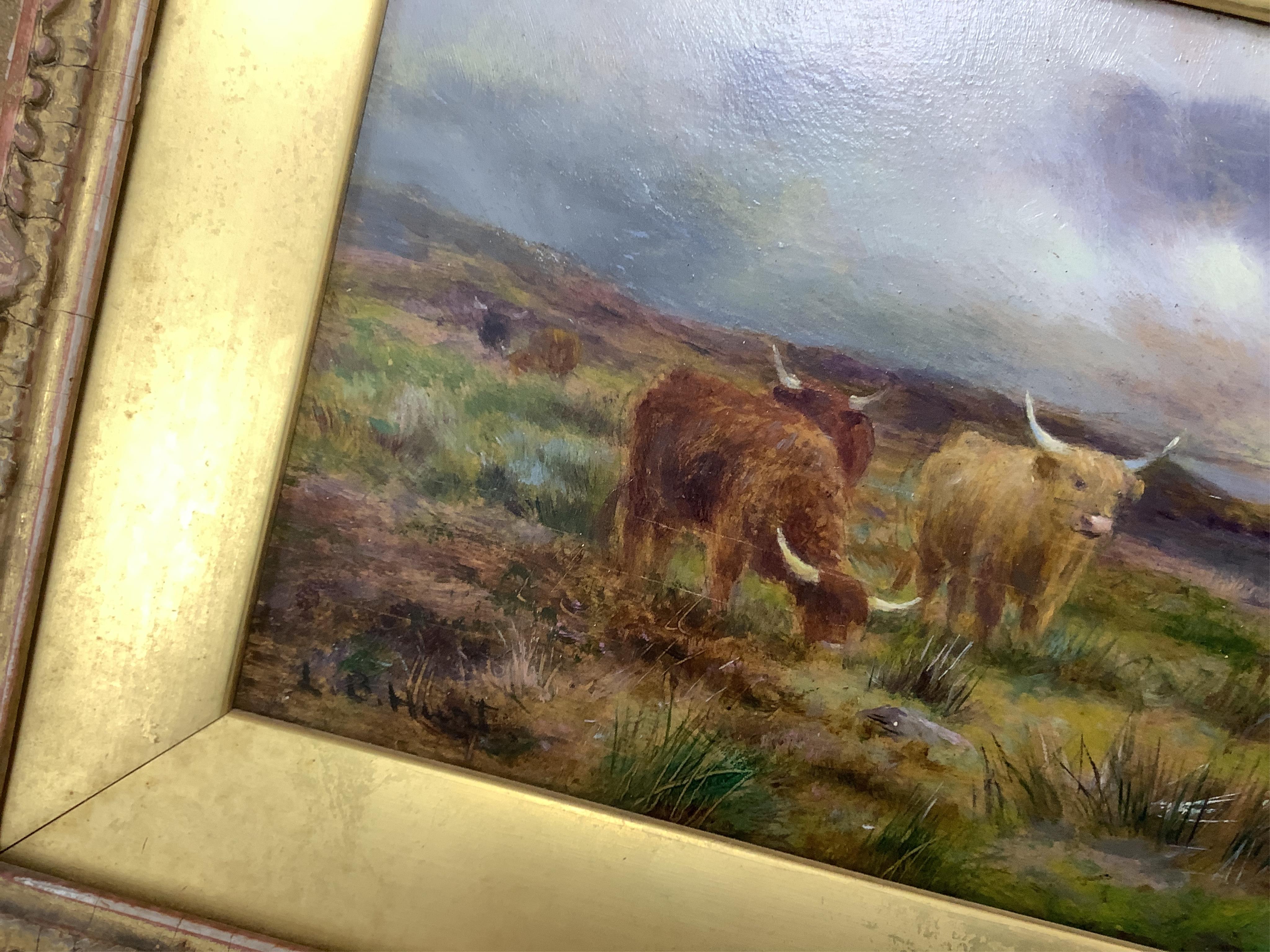 Louis Bosworth Hurt (1856-1929), Highland cattle by a loch, signed, oil on board, 12 x 23cm